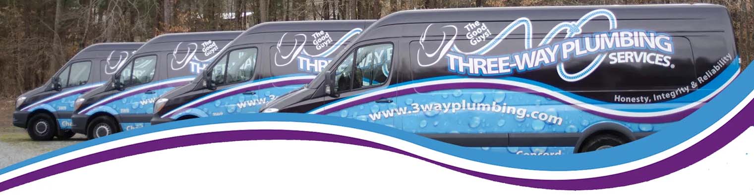 Fleet of branded plumbing service vans from Three-Way Plumbing